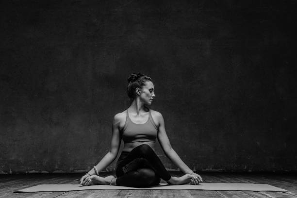 istock Young beautiful yoga female posing in studio 923314654