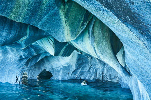 Marble Caves of Chile The Marble Caves of Patagonia, Chile. Turquoise colors and splendid shapes create imagery of unearthly beauty carved out by nature. patagonia chile photos stock pictures, royalty-free photos & images