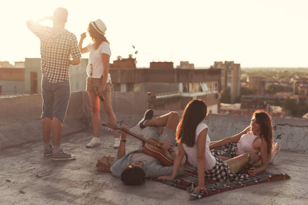 istock Friends hanging out on a building rooftop 923325194