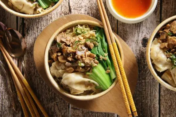 Photo of Chicken Noodle Soup with Wontons and Bok Choy