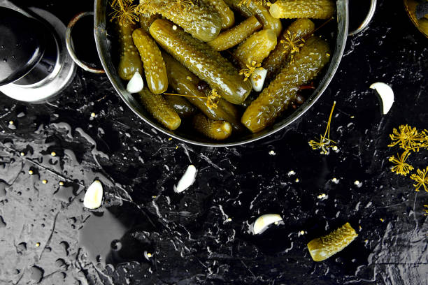 istock Canned cucumbers in a metal pan. 923333768