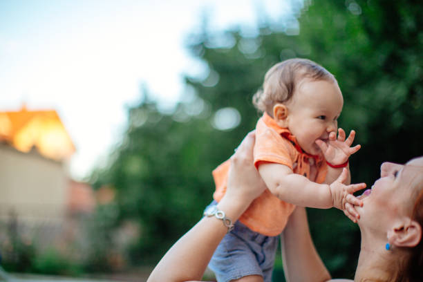 istock Mother holding baby 923334856