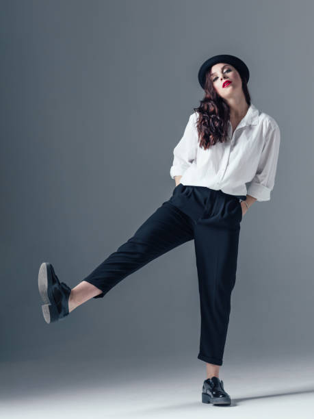 istock Young beautiful female dancer is posing in the studio 923335258