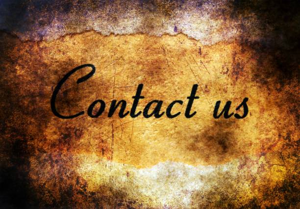 istock Contact us text on grunge background 923335978