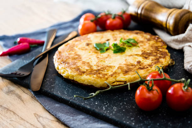 istock omelet with ham tomato and green salad 923341772
