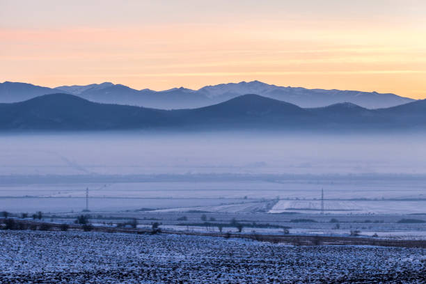 istock City covered by the fog during sunset 923344680