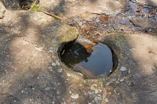 The hole on the rock surface.