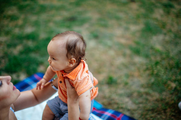 istock Single mother picnic with baby 923348020