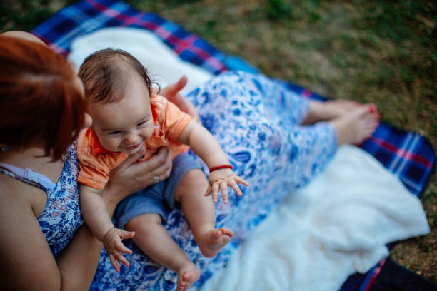 istock Single mother picnic with baby 923348194