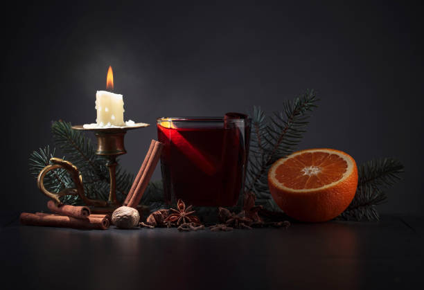 istock Mulled wine with spices and orange . 923348392