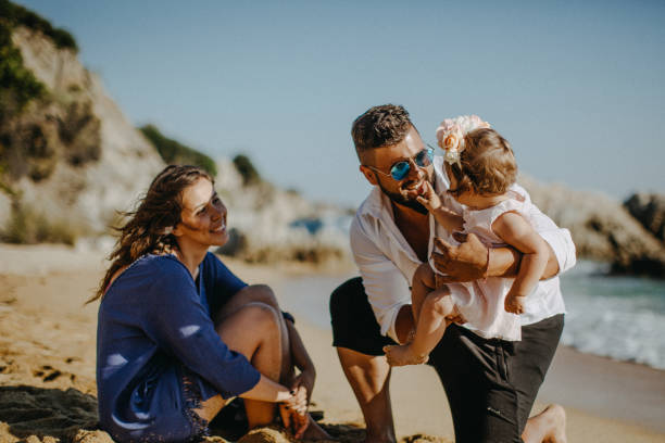 istock Beautiful family on the beach 923351470