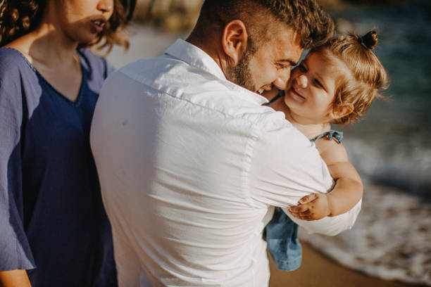 istock Beautiful family on the beach 923352064