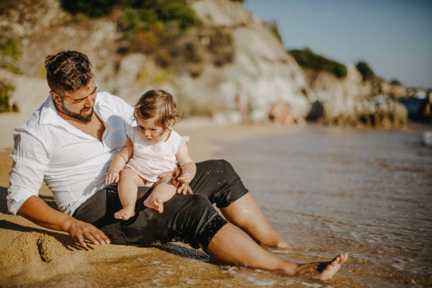 istock Dad and child daughter playing together outdoors on a summer 923352858