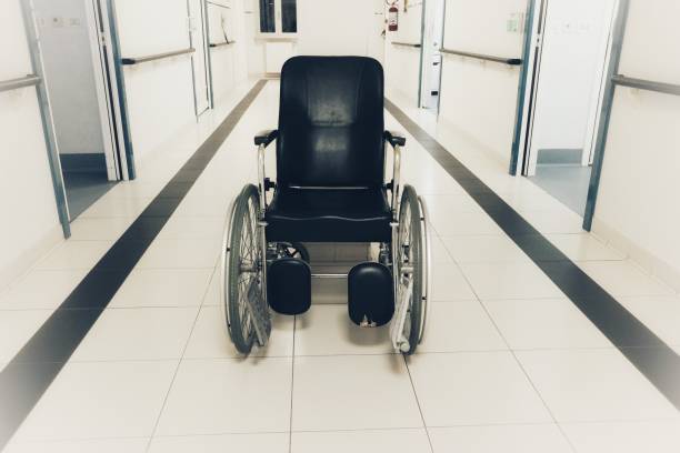 istock empty wheelchair in the hospital corridor 923355660
