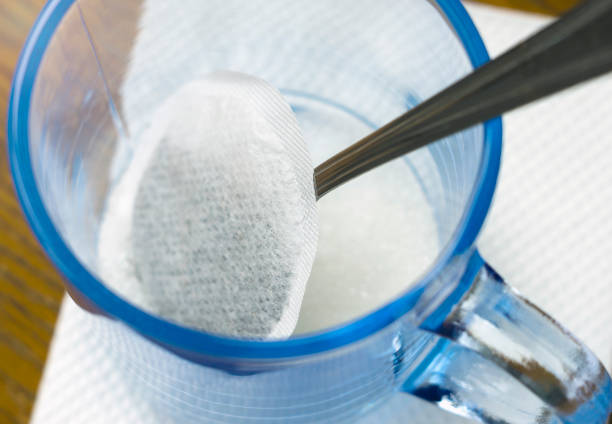 istock Tea bag in clear cup with sugar. Close-up, selective focus. 923356590