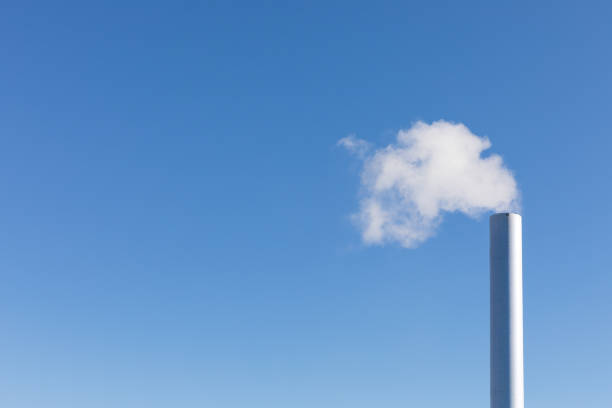 steaming chimney of an incinerator - incinerator imagens e fotografias de stock