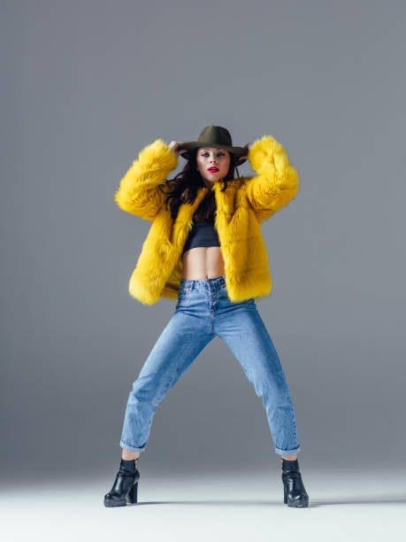 istock Young beautiful female dancer is posing in the studio 923360176