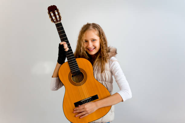 istock Girl playing guitar 923360290