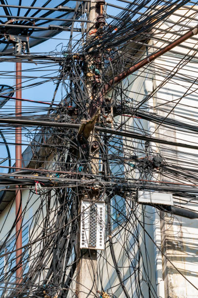 istock Messy electric wires on the electric pole 923370234