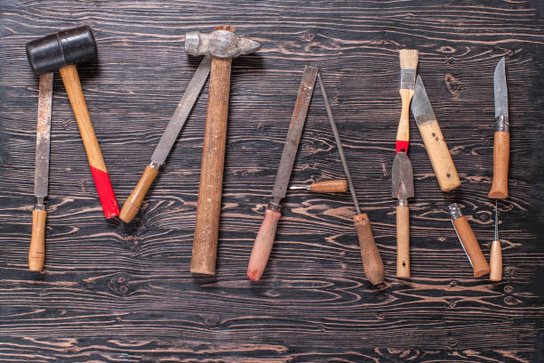 istock The inscription MAN is written by work tools. The word MAN is made up of a work tools 923370478