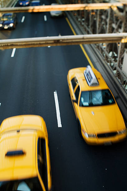 istock taxis on the Brooklyn Bridge 92337778