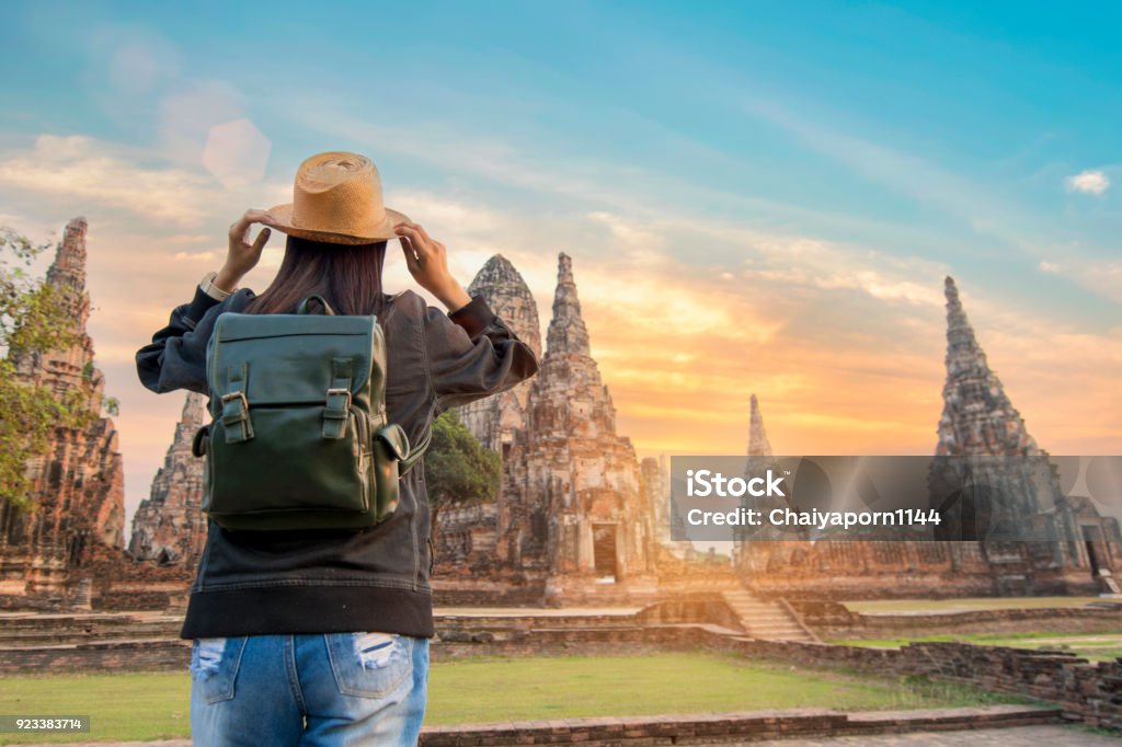 beautiful  hipster travel relaxing at Ayutthaya historical park thailand during sunset time Thailand Stock Photo