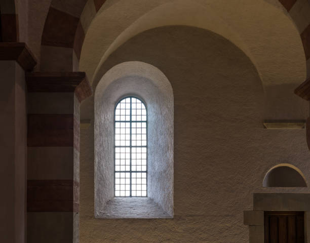 istock The old and ancient window in dark room 923385902