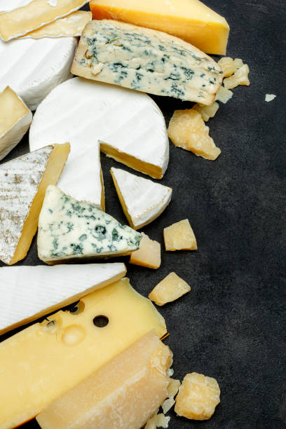 istock Various types of cheese - parmesan, brie, roquefort, cheddar 923391594