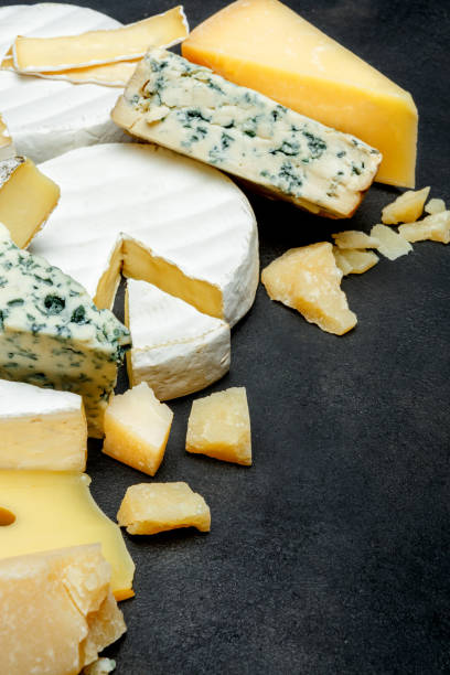 istock Various types of cheese - parmesan, brie, roquefort, cheddar 923391616