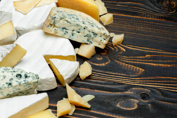 istock Various types of cheese - parmesan, brie, roquefort, cheddar 923393940