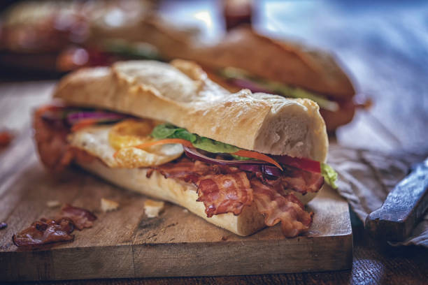 Chef making sandwich with fresh ingredient.Delicious nutrition