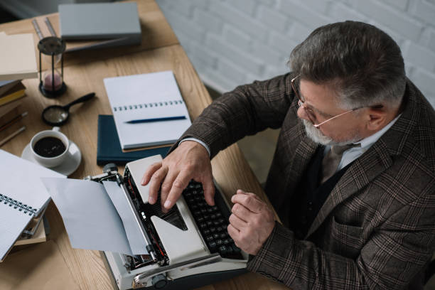 istock high angle view of senior writer working with typewriter 923409688