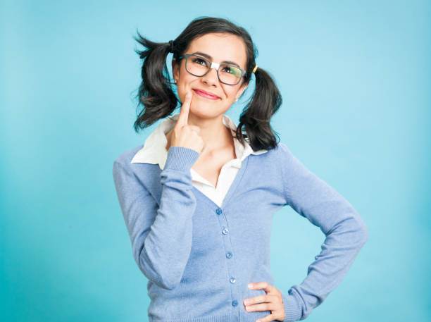 istock Nerdy Woman Against Blue Background 923417296