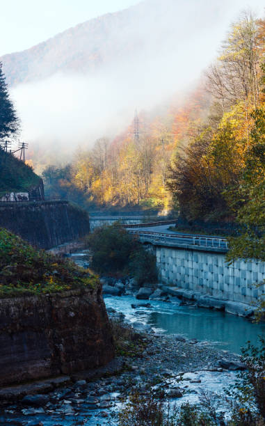 istock Autumn Carpathian mountains and river, Ukraine 923418130