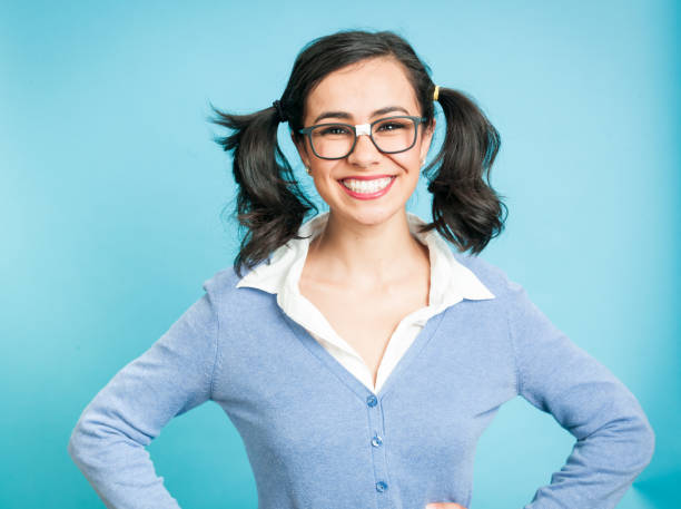 istock Nerdy Woman Against Blue Background 923418338