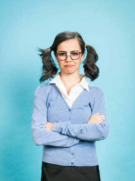 istock Nerdy Woman Against Blue Background 923418738