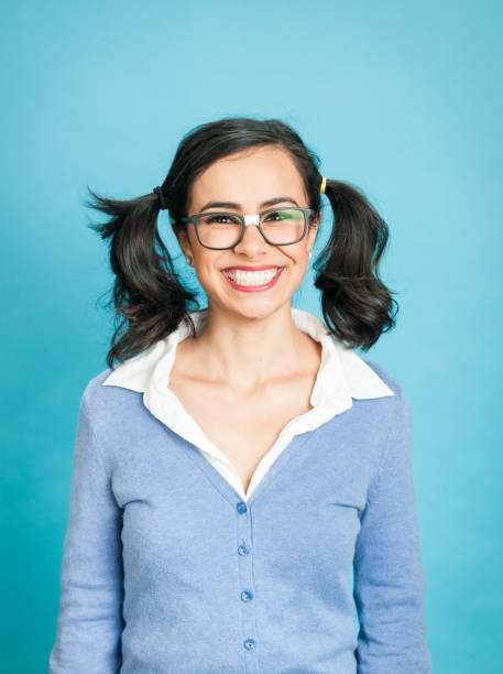 istock Nerdy Woman Against Blue Background 923419052