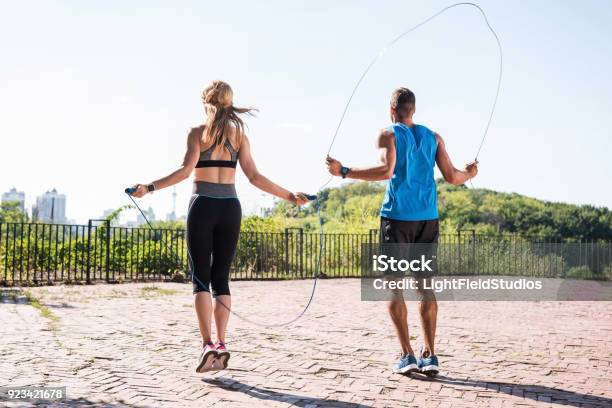 Jumping On Skipping Ropes Stock Photo - Download Image Now - Jumping Rope, Jump Rope, Men