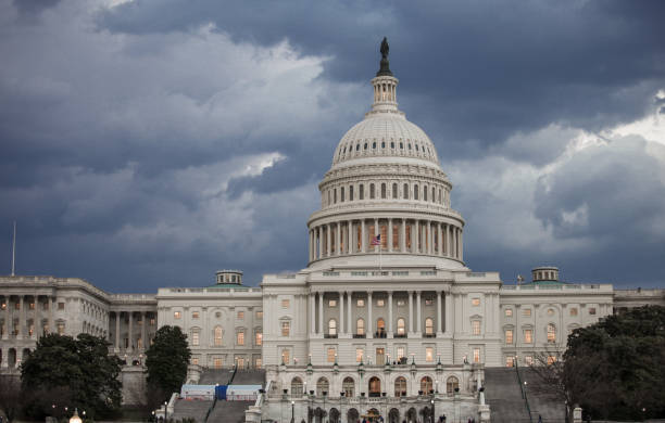 istock United States Capitol West with Dark Clouds in Washington, DC 923421796