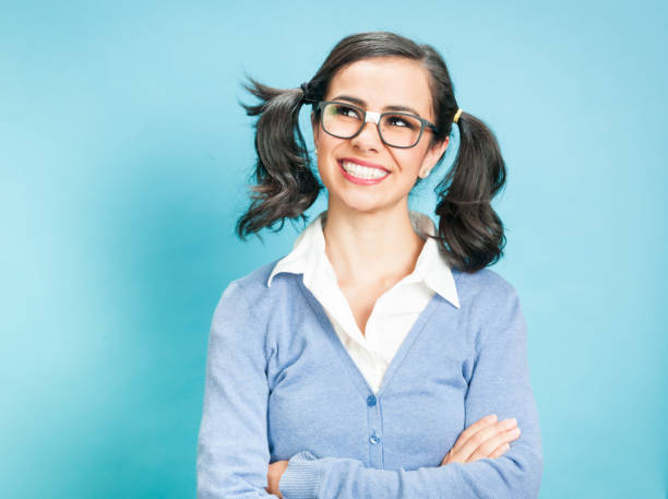 istock Nerdy Woman Against Blue Background 923422610