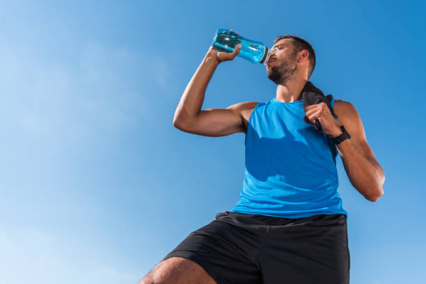 istock sportsman drinking water 923434050