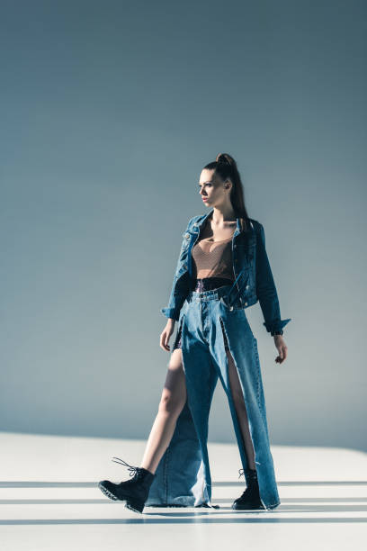 istock beautiful woman in trendy denim clothes 923437962