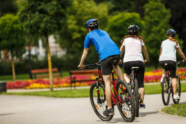 istock Urban biking- three people riding bikes in city 923441888