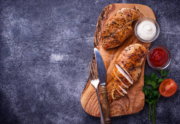 istock Grilled chicken breast or fillet on iron pan 923456014