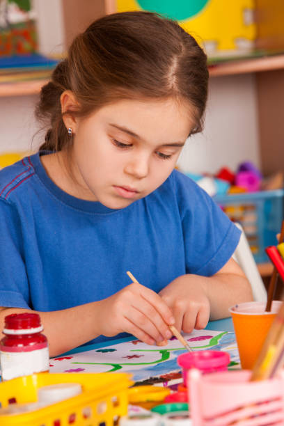 small students children painting in art school class. - preschooler plant preschool classroom imagens e fotografias de stock