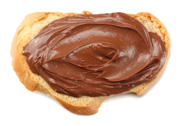 istock Slice of bread with chocolate cream isolated on white background 923473552