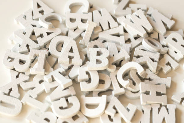 istock flat lay wooden letters, close up, white background 923476426
