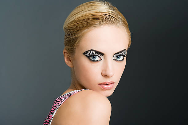 Woman with zebra stripe eye makeup  crazy makeup stock pictures, royalty-free photos & images