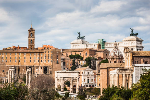 istock Roman forum view with cloudy sky on the background 923485294