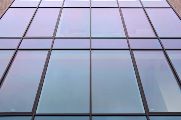 istock Modern building. Modern office building with facade of glass 923488964